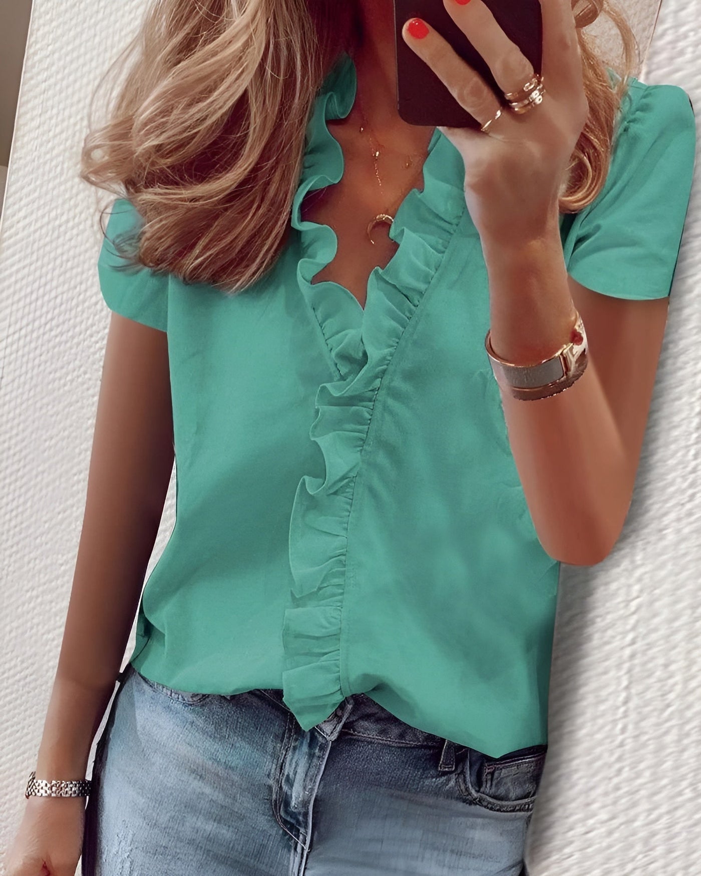 Asta™ – Luftig og elegant bluse med volanger